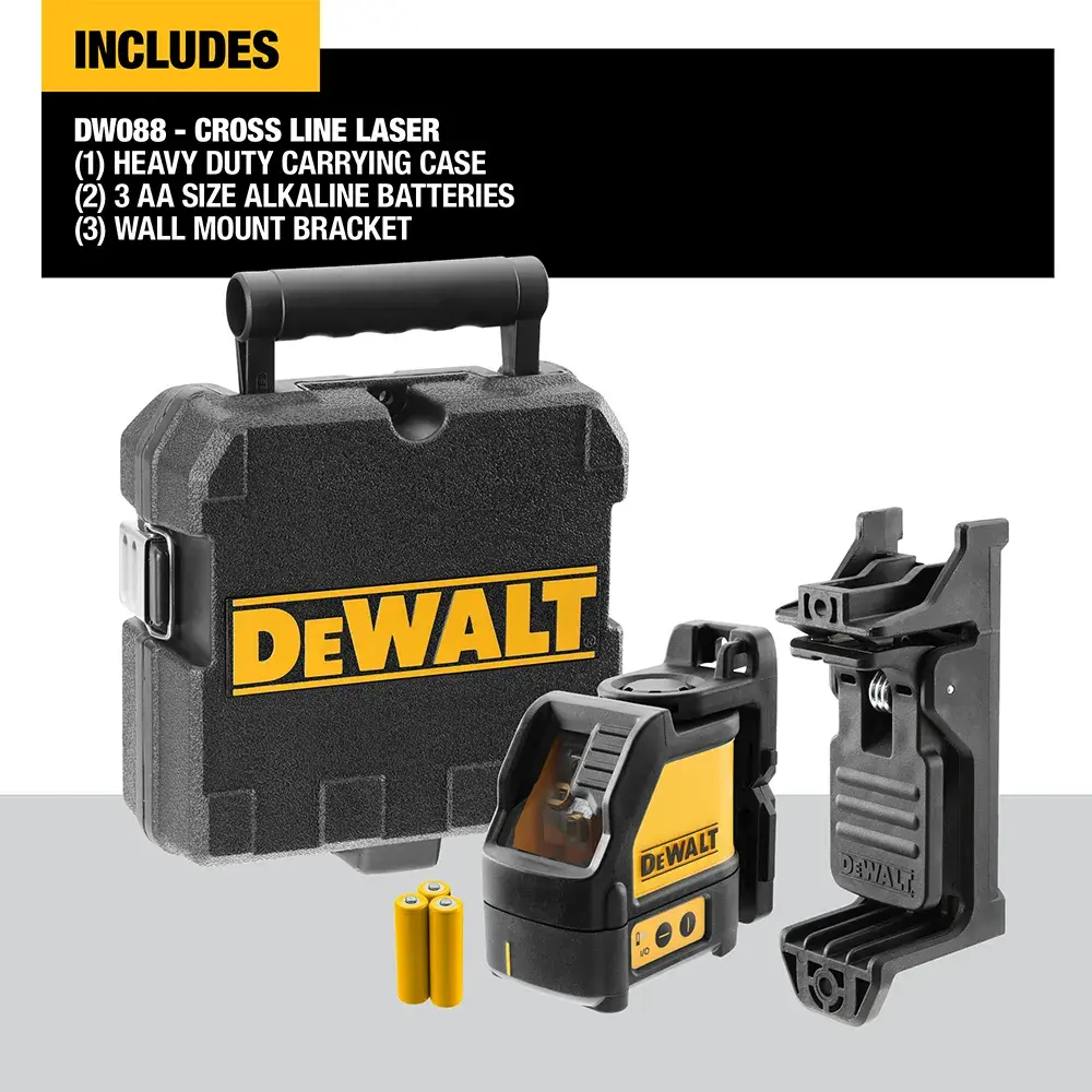 A DEWALT DW088CG green laser level placed on a concrete floor in a construction site, projecting a green laser line for alignment.
