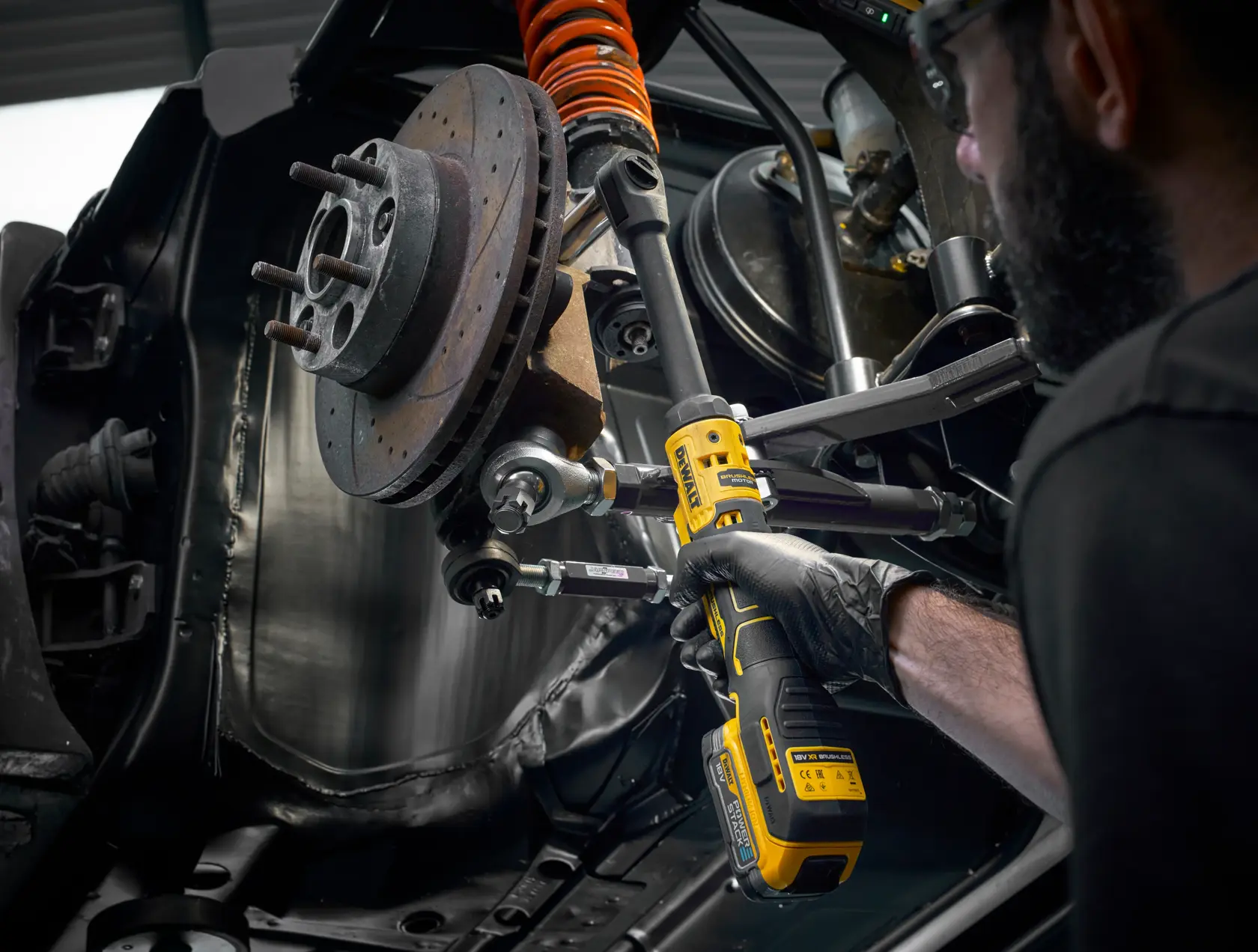 DEWALT tool in use on car part, SKUs DCF513EN-XJ, DCF513EN. Automotive photography scene.