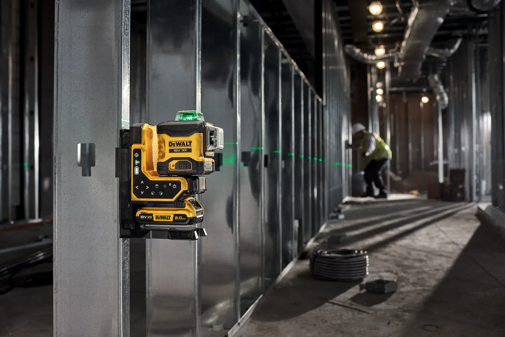 A DEWALT DCLE34035D1 18V XR lithium-ion laser level in yellow and black, featuring a sturdy base and labeled with product information.