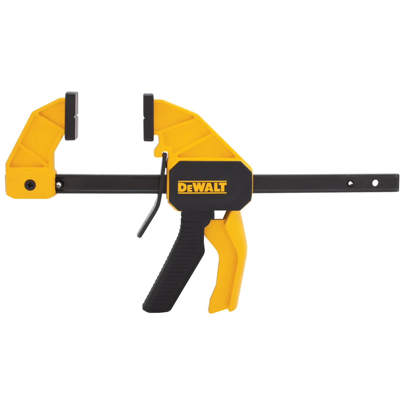 A construction worker wearing a safety helmet and neon green shirt uses a yellow DEWALT clamp to secure wooden beams at an outdoor job site.